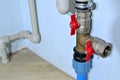 Piping and plumbing fitting in the home industry of the modern era. Connecting pipe warm water floor to the manifold heating