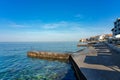 Piran concrete beach with clear water in the morning