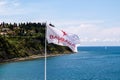 Piran - Flag of luxury hotel Barbara with scenic view of Adriatic Sea in Slovenia.