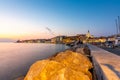 Piran Slovenia: City coast after the sunset with night lights in restaurants. Look from the Piran harbor to city coast. Tourist