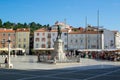 Piran, Slovenia; 7/19/19: Tartini Square with the Giuseppe Tartini statue and some bar terraces at the background, in the old town