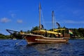 Pirate boat and coastline Royalty Free Stock Photo