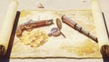 Pirate compass with pistol and spyglass lie on the treasure map. Pirate treasure and old pirate map on pirate island. 3D Royalty Free Stock Photo