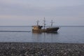 Pirate historical wooden sail ship at the open sea. classic wooden sailing ship, billowing sails against blue sky. Concept of Royalty Free Stock Photo