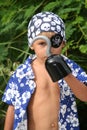Pirate kid looking trough hook Royalty Free Stock Photo