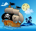 Pirate sailboat with island silhouette Royalty Free Stock Photo