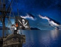 Pirate sailship with flag at moonlight