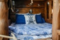 pirate ship bed with blue and white sheets Royalty Free Stock Photo