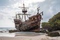 pirate ship, deserted and decaying on deserted island