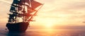 Pirate ship sailing on the ocean at sunset