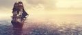 Pirate ship sailing on the ocean at sunset Royalty Free Stock Photo