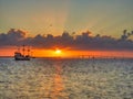 Pirate Ship Sailing into the Sunset Royalty Free Stock Photo