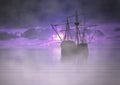 Pirate Ship at Sunrise with Fog Royalty Free Stock Photo