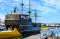 Pirate ship surrounded by fishing boats in the bay of Ayia Napa