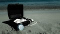a pirate treasure chest on a sandy beach.a treasure trove of seashells, antique watches and jewelry found Royalty Free Stock Photo