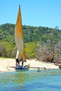 pirogue beach seaweed in people sand isle sky and