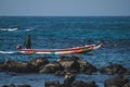 Pirogue on the way into port