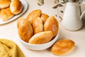 Pirozhki, piroshki. Homemade baked yeast leavened boat shaped buns