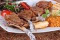 Pirzola Meat Kebabs onions on a white plate from a close angle Royalty Free Stock Photo