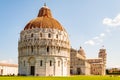 The Pisa Baptistery of St. John or Battistero di San Giovanni, Pisa Cathedral or Cattedrale di Pisa and the Leaning Tower of Pisa Royalty Free Stock Photo