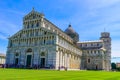 Pisa Cathedral Duomo di Pisa with Leaning Tower of Pisa on Piazza dei Miracoli in Pisa, Tuscany, Italy. World famous tourist Royalty Free Stock Photo