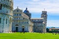 Pisa Cathedral Duomo di Pisa with Leaning Tower of Pisa on Piazza dei Miracoli in Pisa, Tuscany, Italy. World famous tourist Royalty Free Stock Photo