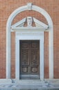 Pisa: Church of Santo Stefano dei Cavalieri, side entrance door Royalty Free Stock Photo