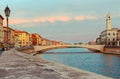 Pisa cityscape with Arno river and Ponte di Mezzo bridge. Tuscany, Italy.