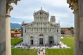 PISA, ITALY - August 14, 2019: The cathedral of Pisa near the leaning tower of Pisa with lots of tourists Royalty Free Stock Photo