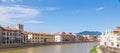 Pisa, Italy - colourful buildings on Arno river. Urban skyline, travel destination