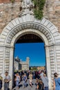 Pisa, Italy - 25 June 2018: The leaning tower of pisa viewed through entrace arch of Piazza dei Miracoli
