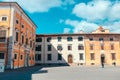 Pisa, Italy - March 18, 2023: Piazza dei Cavalieri, Palazzo della Carovana, Palazzo dell'Orologio in Pisa, Italy