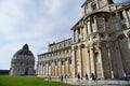 Pisa, Italy. September 18, 2923. The baptisterium, the duoma, cathedral and the leaning tower of Pisa. Royalty Free Stock Photo