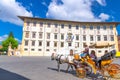 Pisa, Italy, September 14, 2018: Tourists in carriage chariot on Piazza dei Cavalieri Royalty Free Stock Photo