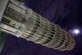 Pisa, the leaning tower by night with moon