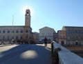 Pisa Tuscany Italy. Ponte Mezzo bridge and the Palazzo Pretorio with clocktower