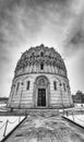 Pisa under the snow. The famous baptistery in Field of Miracles after a snowstorm