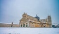 Pisa under the snow. The famous cathedral in Field of Miracles after a snowstorm