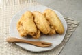 Pisang goreng or banana fritters (deep fried banana fritter with flour batter). Royalty Free Stock Photo