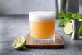 Pisco sour cocktail - whiskey with lime juice, sugar syrup and egg white in glass Royalty Free Stock Photo