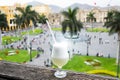 Pisco sour homemade cocktail with the background of the main square of Lima