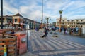 Pismo Beach Pier plaza with walking people, downtown of Pismo Beach, California