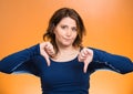 off woman, giving thumb down gesture with hand Royalty Free Stock Photo