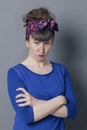 off young woman with trendy hairstyle sulking, looking furious Royalty Free Stock Photo