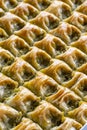 Pistachio baklava. Close-up pistachio baklava. Turkish baklava dessert. Story format Royalty Free Stock Photo