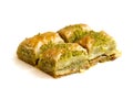 Pistachio baklava dessert isolated on white background. Turkish sweet dessert. Close up Royalty Free Stock Photo