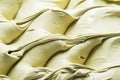 Pistachio flavour gelato - full frame detail. Close up of a creamy green surface texture of Pistachio Ice cream