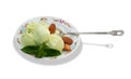 Pistachio ice cream with mint leaves isolated Royalty Free Stock Photo