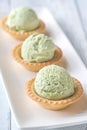 Pistachio ice cream in the pastry shells