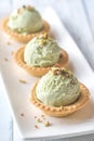 Pistachio ice cream in the pastry shells